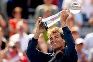 Rafael Nadal celebrates with the winner's trophy after defeating Milos Roanic during the final of the Rogers Cup at Uniprix Stadium on August 11, 2013 in Montreal, Canada. (Getty Images)