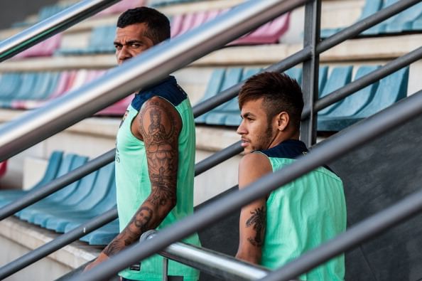 Dani Alves defends Neymar over avoiding media