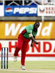 Maurice Odumbe of Kenya bowls