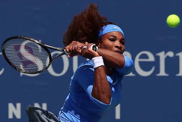 Erratic Serena Williams moves into third round at Cincinnati