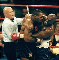 Tyson bites off Holyfield's ear