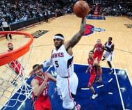 Josh Smith #5 of the Atlanta Hawks goes in for a dunk