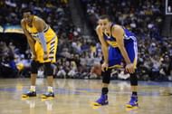 Andre Iguodala (9) and Stephen Curry (30) take a breather during a break in the action in the third quarter. The Denver Nuggets took on the Golden State Warriors in Game 2 of the Western Conference First Round Series at the Pepsi Center in Denver, Colo. on April 23, 2013. (Getty Images)