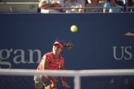 Li Na in action vs Serena Williams during the US Open Women's Semifinals