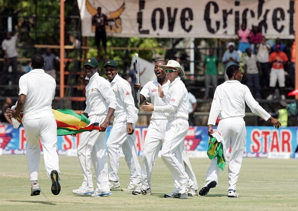 Zimbabwe players celebrate victory over Pakistan on September 14, 2013 during the fifth day of the second Test against at the Harare Sports Club.                              (Getty Images)