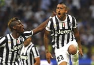 Arturo Vidal (R) of Juventus FC celebrates his goal with team-mate Paul Pogba (L) during the Serie A match between FC Internazionale Milano and Juventus FC at San Siro Stadium