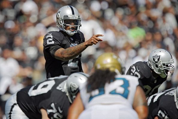 Quarterback Terrelle Pryor #2 of the Oakland Raiders points out the defense against the Jacksonville Jaguars in the first half on September 15, 2013 at O.co Coliseum in Oakland, California.  The Raiders won 19-9. (Getty Images)