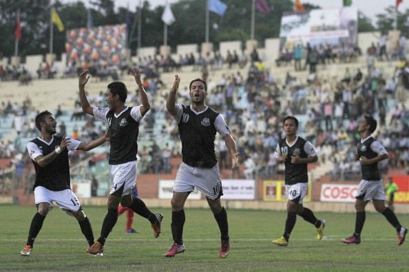 Tolgay Ozbey (10) of Mohammedan Sporting with team mates after scoring goal against ONGC during the Durand Cup final