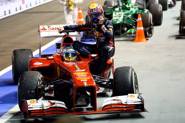 Mark Webber penalised after hitching post-race ride on Fernando Alonso's car