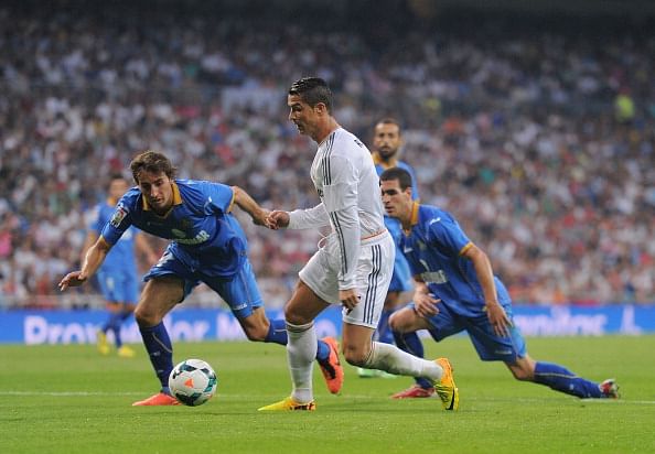 European roundup: Ronaldo brace help Real win, while Pepe Reina's heroics help Napoli win at the San Siro