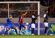 Costa Rica's Johnny Acosta celebrates after scoring against USA.