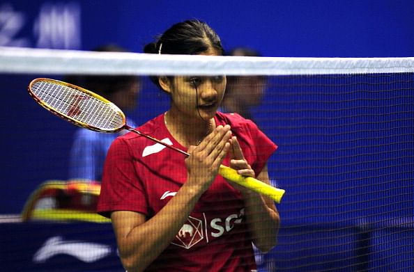 Porntip Buranaprasertsuk of Thailand greets Liu Xin of China during the women&#039;s singles final  of the 2013 China Masters in Changzhou, on September 15, 2013. Liu won 21-4, 13-21, 21-12.     (Getty Images)