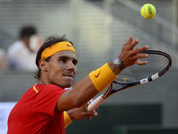 Rafael Nadal hits the ball into the crowd after defeating Ukraine&#039;s Sergiy Stakhovsky