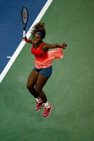 Serena Williams jumping for joy after her victory