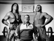Stu Hart(C) with Bret(L) and Owen Hart(R)