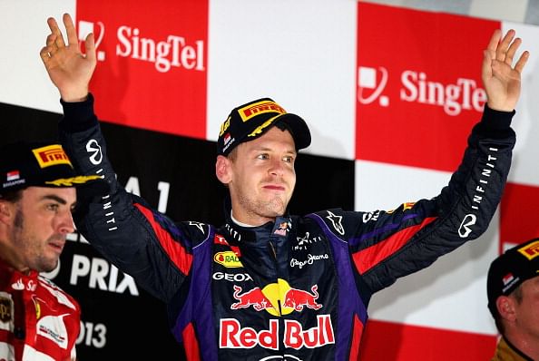 Sebastian Vettel of Germany and Infiniti Red Bull racing celebrates following his victory during the Singapore Formula One Grand Prix at Marina Bay Street Circuit on September 22, 2013 in Singapore, Singapore.  (Getty Images)