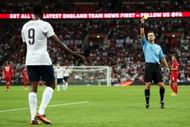 England's Danny Welbeck gets yellow carded against Moldova