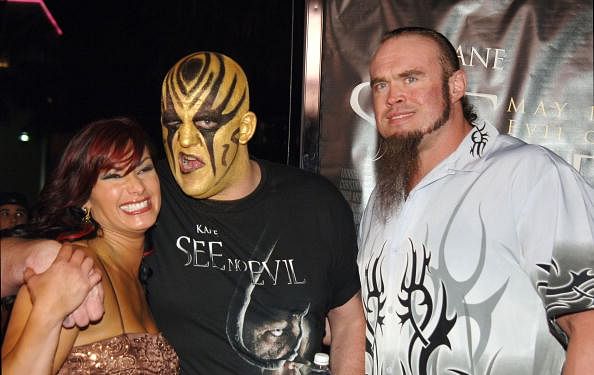Goldust ( middle) with Victoria (left) and Gene Snitsk(right)