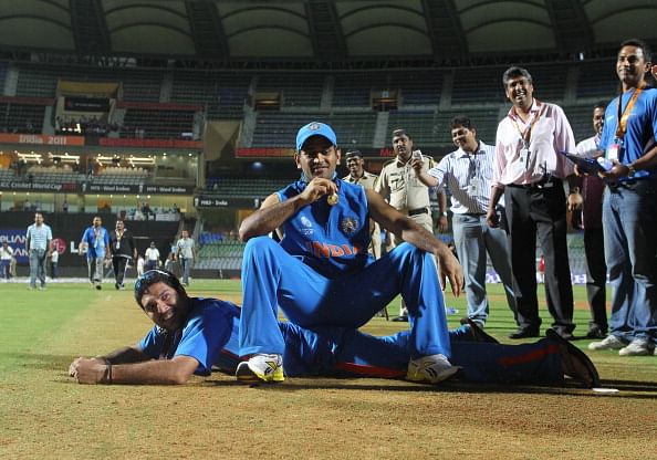 MS Dhoni and Yuvraj Singh pose together after India won the 2011 World Cup