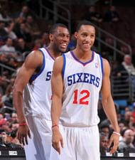 Evan Turner #12 and Thaddeus Young #21 of the Philadelphia 76ers smile during the game against the Sacramento Kings on January 10, 2012 at the Wells Fargo Center in Philadelphia, Pennsylvania. (Getty Images)