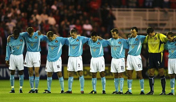 Sunderland line up for a minutes silence
