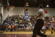 Canadian basketball phenomenon Andrew Wiggins risinig high for a dunk when his Huntington Prep basketball team played the United Leadership Academy at McMaster University in Hamilton. (Getty Images)