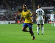 Serge Gnabry celebrates after scoring during the Barclays Premier League match between Swansea and Arsenal at Liberty Stadium on September 28, 2013 in Swansea, Wales. (Getty Images)