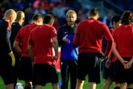 Jürgen Klinsmann talks with players during a training session for the US Men's National Soccer Team in advance of their game vs Jamaica at Sporting Park on October 9, 2013 in Kansas City, Kansas. (Getty Images)