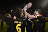 Marc Wilmots (up), head coach of Belgium celebrates the win and qualification for World Cup after the match vs. Croatia on October 11, 2013 in Zagreb, Croatia. (Getty Images)