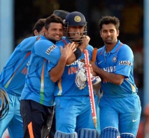 Players celebrate with their captain after winning the Celkon Cup, in West Indies