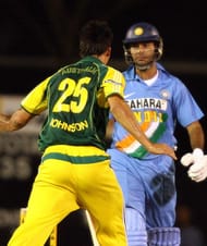 Australian pacer Mitchell Johnson (L) ju