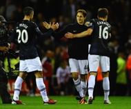 Adnan Januzaj is congratulated on his goals by Robin Van Persie and Michael Carrick after victory in the Barclays Premier League match between Sunderland and Manchester United at Stadium of Light on October 5, 2013 in Sunderland, England. (Getty Images)