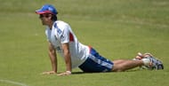 Alastair Cook works on his back on Tuesday