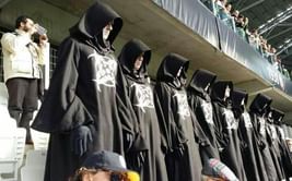 Mysterious men dressed in black robes reappear in Serie A match