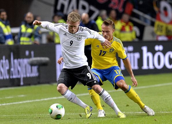 Germany coach Joachim Low says Schurrle has improved after Chelsea move
