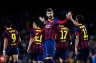 Neymar (R) celebrates with his team-mate Gerard Pique after scoring during the La Liga match between FC Barcelona and Real Valladolid CF at Camp Nou on October 5, 2013 in Barcelona, Spain. (Getty Images)