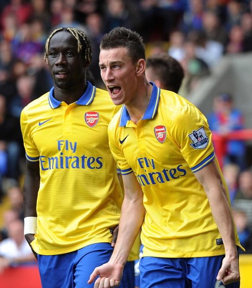Laurent Koscielny (R) and Bacary Sagna celebrate after their team&#039;s second goal is scored during the match between Crystal Palace and Arsenal at Selhurst Park 