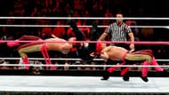 Los Matadores drop McIntyre with a double-team reverse STO
