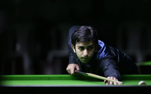 Advani makes last eight grade