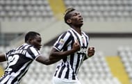 Paul Pogba (R) celebrates with team-mates after scoring during the Serie A match Torino vs Juventus at the Olimpico stadium on September 29, 2013 in Turin. (Getty Images)