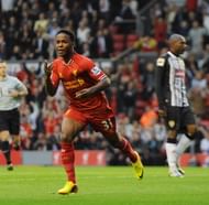 Raheem Sterling celebrates his goal during the Capital One Cup second round match between Liverpool and Notts County at Anfield on August 27, 2013 in Liverpool, England. (via Getty Images)