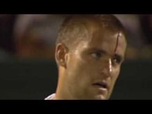 Video: Mikhail Youzhny smashes his racquet on his head after losing a point