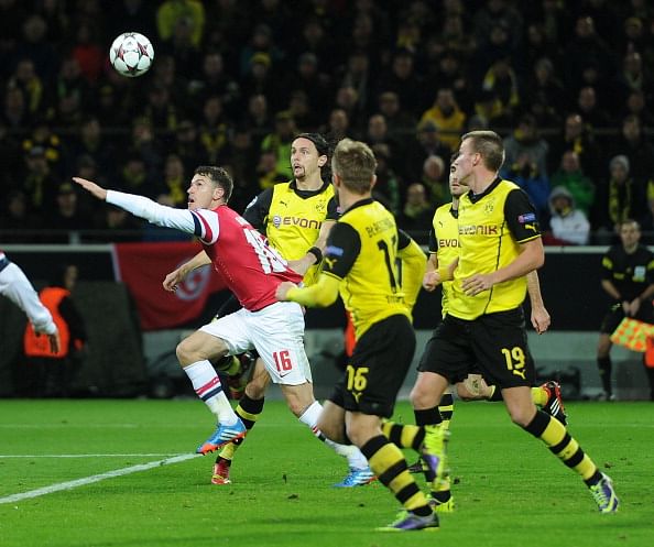 Arsenal brings down Dortmund's yellow fortress