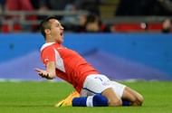 Alexis Sanchez of Chile celebrates after scoring the second goal