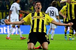 Will Borussia Dortmund qualify for the Round of 16 ?