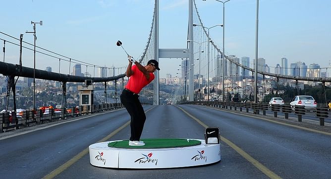 Tiger Woods becomes the first golfer to hit balls from Asia to Europe off the Bosphorus Bridge