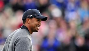 Tiger Woods hits a golf ball from Europe to Asia
