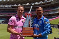 South Africa's captain AB de Villiers and India's cricket captain MS Dhoni pose with the One-Day Internationals (ODI) cup