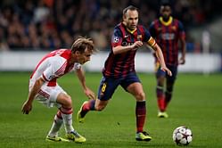 Andres Iniesta snubs Manchester United to pen new deal with Barcelona
