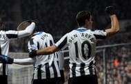 NEWCASTLE, ENGLAND - DECEMBER 26: Hatem Ben Arfa (10) of Newcastle celebrates with Loic Remy (L) after Loic scores Newcastle's third goal during the Barclays Premier League match between Newcastle United and Stoke City at St. James' Park on December 26, 2013, in Newcastle upon Tyne England. (Photo by Serena Taylor/Newcastle United via Getty Images)